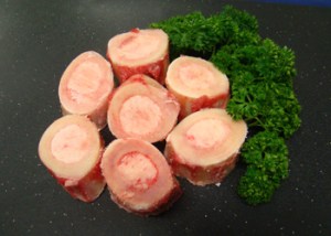 Uncooked beef marrow bone segments